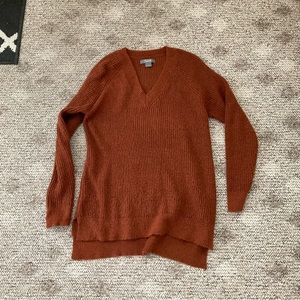 Long burnt orange sweater. Size m